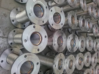 It shows that several metal hoses with large diameter and the hoses have flanges on both ends.