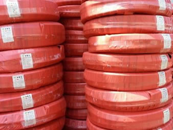 A lot of rolls fuel oil hose packing with weaving bags 