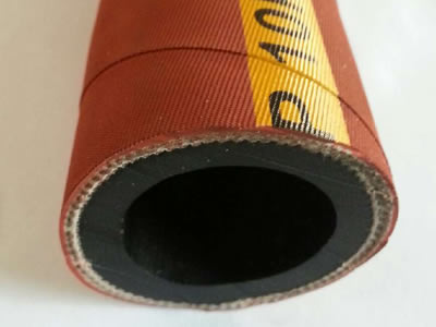 There is one section of sandblast hose with red cover.